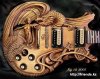 1140411095_carved_guitars14.jpg